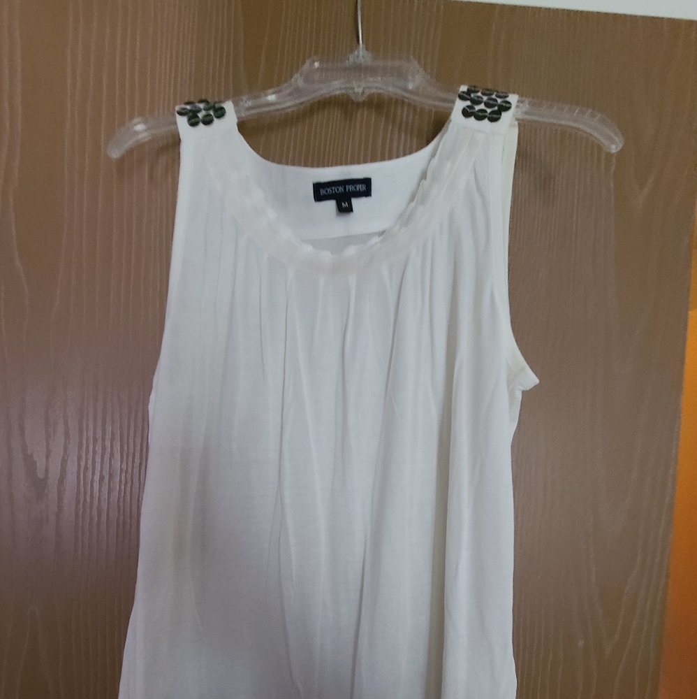 White sleeveless top with detail